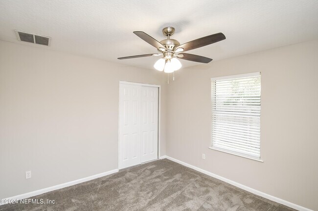 Building Photo - 7263 Eudine Dr N