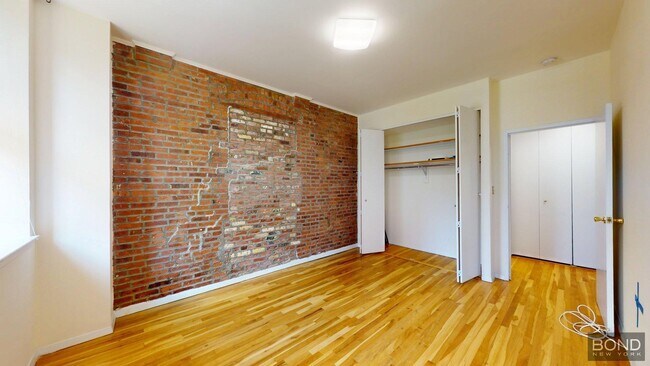 Building Photo - 201 E 12th St