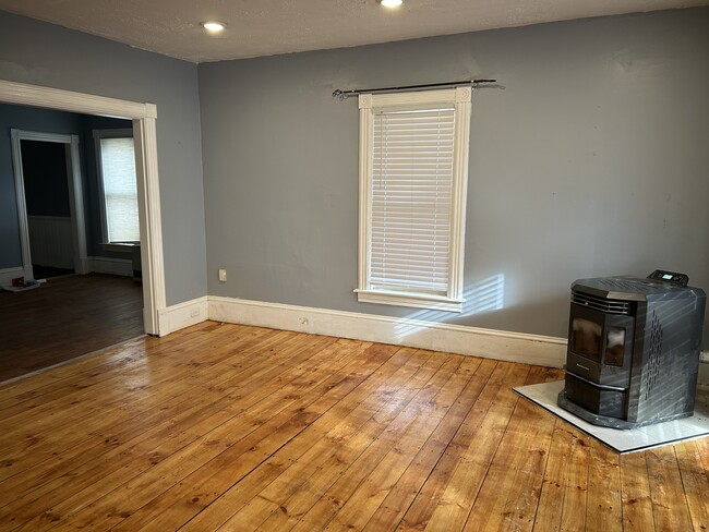 Living room on main floor. - 23 Pleasant St