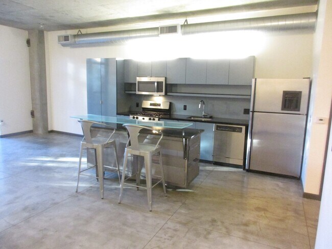 Building Photo - Streetcar Lofts - studio with 1 parking sp...