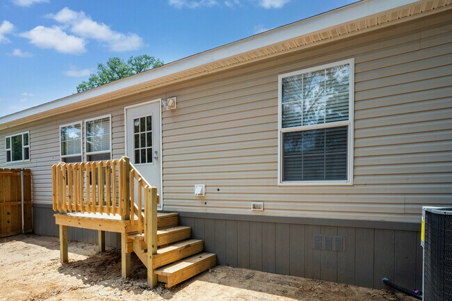 Building Photo - 202 Wild Flower Dr