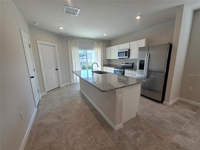 Building Photo - 1210 Port Blue Wy