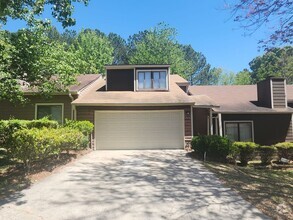 Building Photo - Stylishly Renovated 3BR/ 2BA Townhome with...