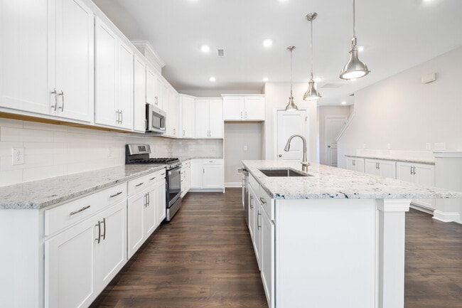 Building Photo - Available 08/15! Spacious Townhome in Prime Andrew Chapel Community