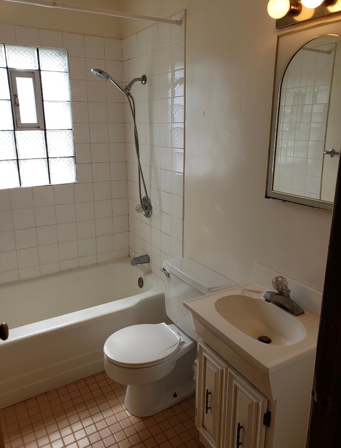 Bathroom with shower/tub, sink, and toliet - 713 John St