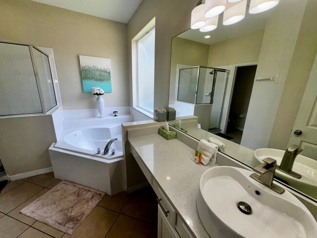 Building Photo - STUNNING Emerald Island Resort 5 bedroom 4...
