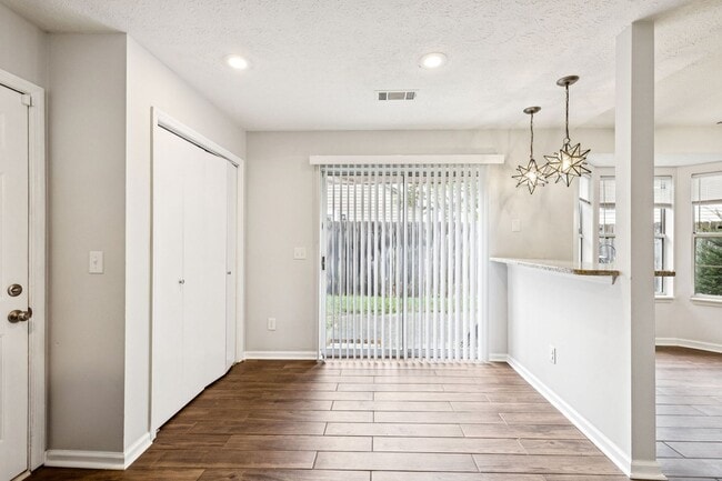 Building Photo - Welcome to this beautifully remodeled sing...