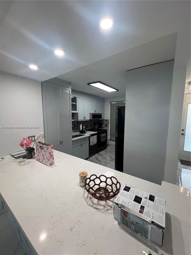 Building Photo - 10240 Collins Ave