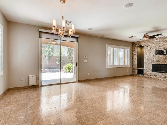 Building Photo - LUXURIOUS UPGRADED HOME IN A GATED SUMMERLIN AREA!!HOUSE HAS POOL AND SPA AND PATIO COVERED BACKY...