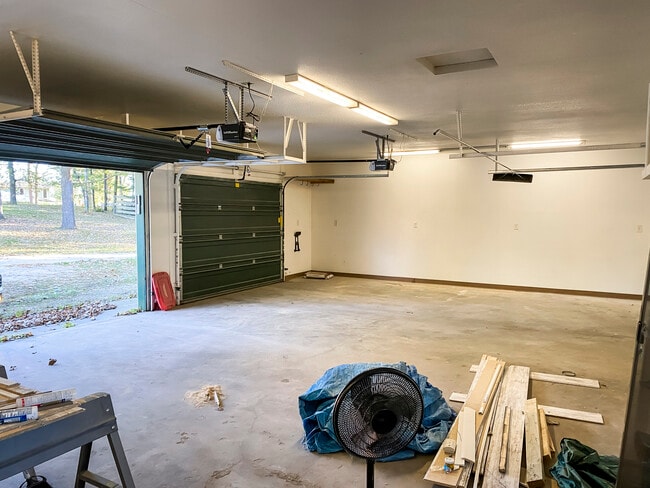 Two-car attached garage - 1606 S Lake Irving Dr SW