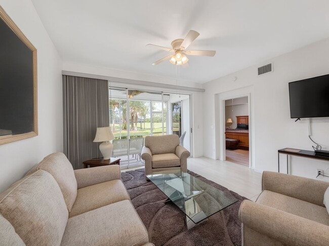 Building Photo - Beautifully furnished 2BR/2BA first-floor condo