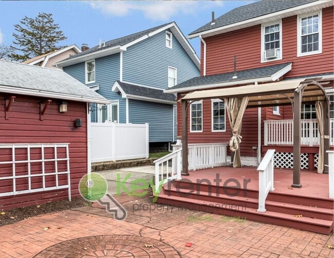 Building Photo - Spacious 3-Bed, 2-Bath Nutley Home with Bonus Office, Multi-Level Deck & Quiet Location