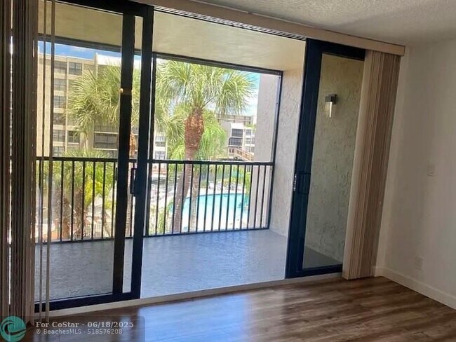 Building Photo - 11 Royal Palm Way