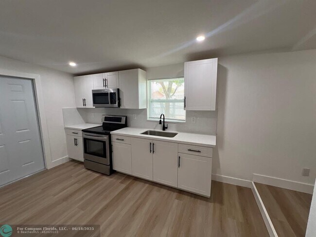 Building Photo - 10540 NW 28th Ave