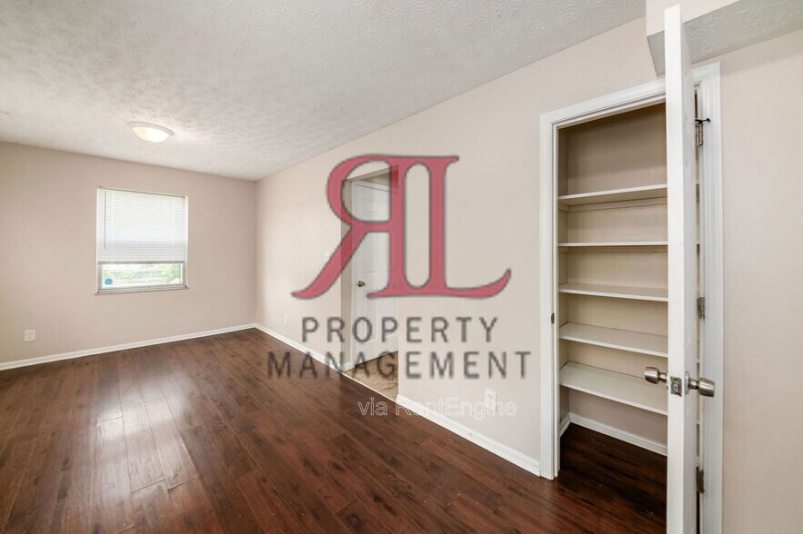 Building Photo - 7179 Feather Ct