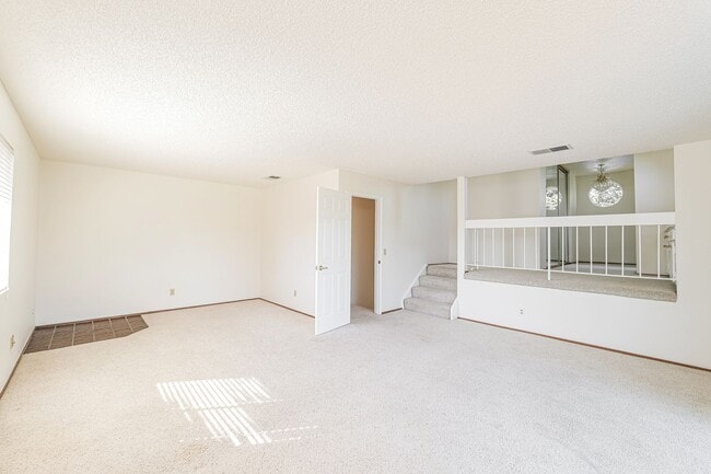 Building Photo - PURE Property Management presents: Beautiful 4 Bedroom Home Near Foxtail Golf Course