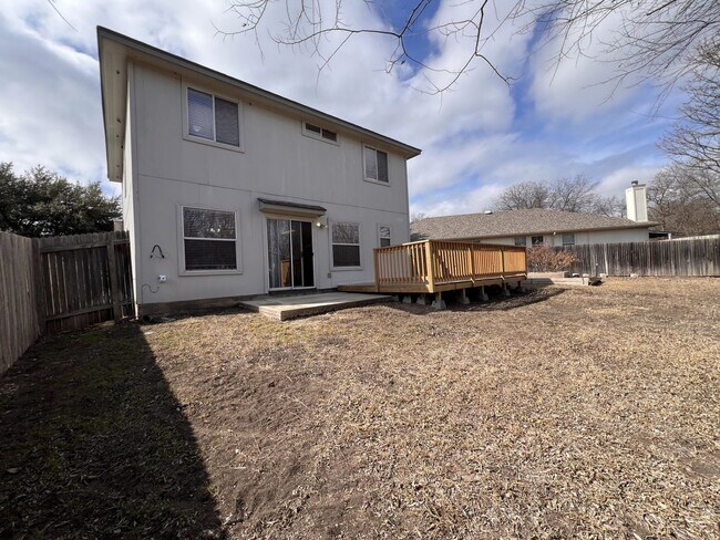 Building Photo - Generous Outdoor Space & Lawn Care Included!