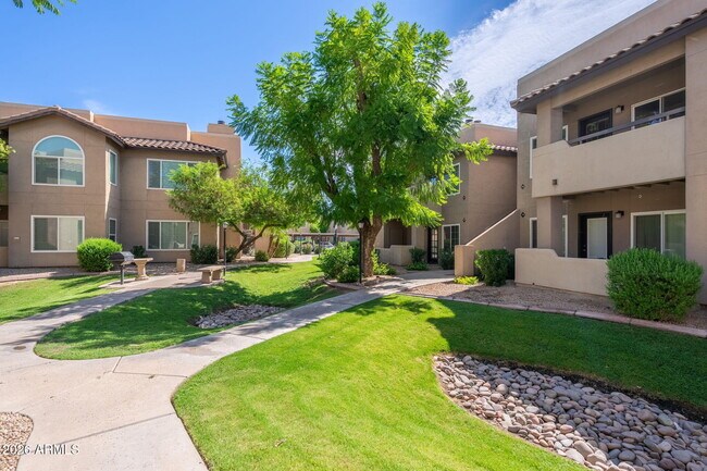 Building Photo - 9450 E Becker Ln