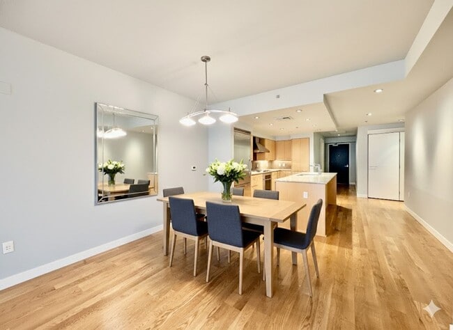 Building Photo - Exquisite Condominium at the Renowned Waterfront Pearl with Views of the River, Work Out Facility...