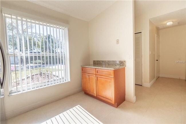 Building Photo - Freshly Painted 3/2 with Fenced Yard & Fireplace!