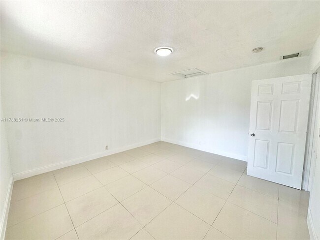 Building Photo - 1497 NE 118th Terrace