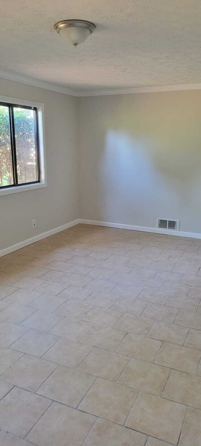 Building Photo - Three Bedroom Split Level Home/Unfinished ...