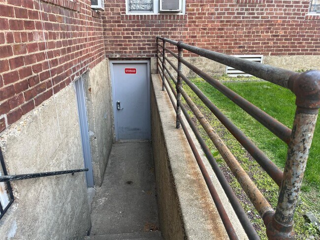 Building Photo - 208-11-208-41 41st Ave