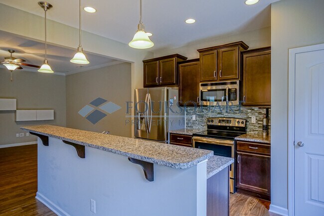 Building Photo - Spacious 3-Bed, 2.5-Bath Townhome with Was...