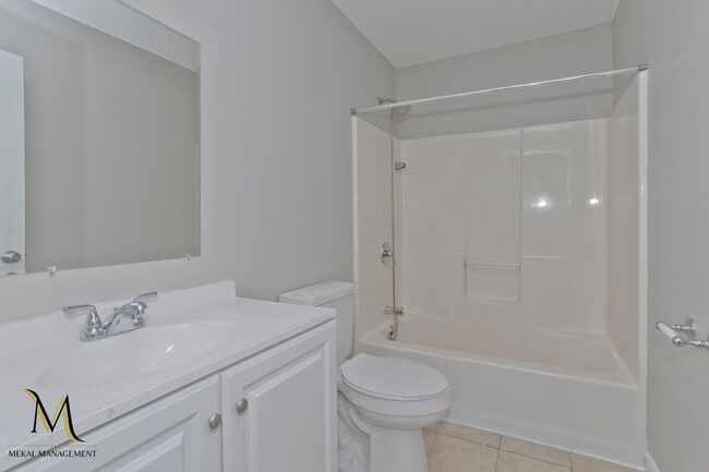 Building Photo - Newly Renovated Duplex Apt | All New Appliances + Off Street Parking