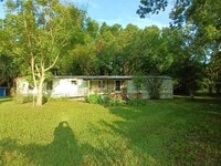 Building Photo - 210 SE Hardin Ct