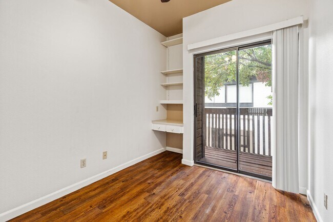 Building Photo - PARK PLACE - ACROSS FROM DKR STADIUM - 1BD / 1BA With Study - WOOD FLOORS - W/D - $1200