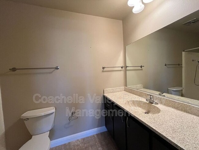 Building Photo - 1950 S Palm Canyon Dr