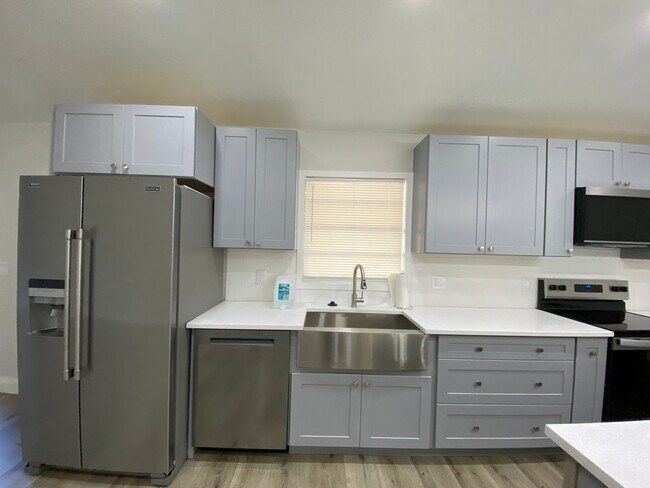 Building Photo - Totally refurbished three bedroom, two bat...