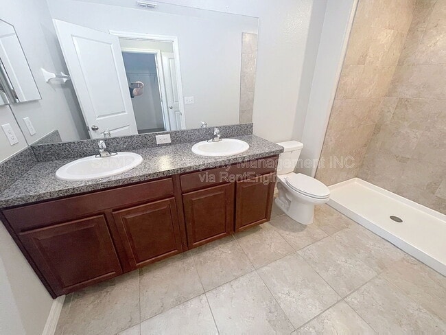 Building Photo - 7648 Ginger Lily Ct