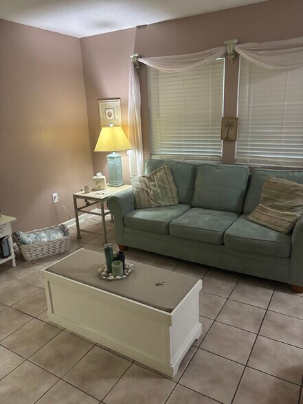 Cozy living room with TV - 614 4th Ave S