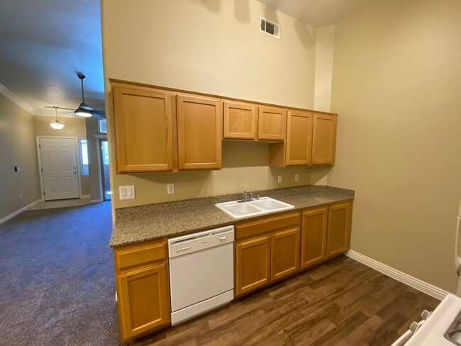 Building Photo - All NEW flooring in this spacious 3-bedroo...