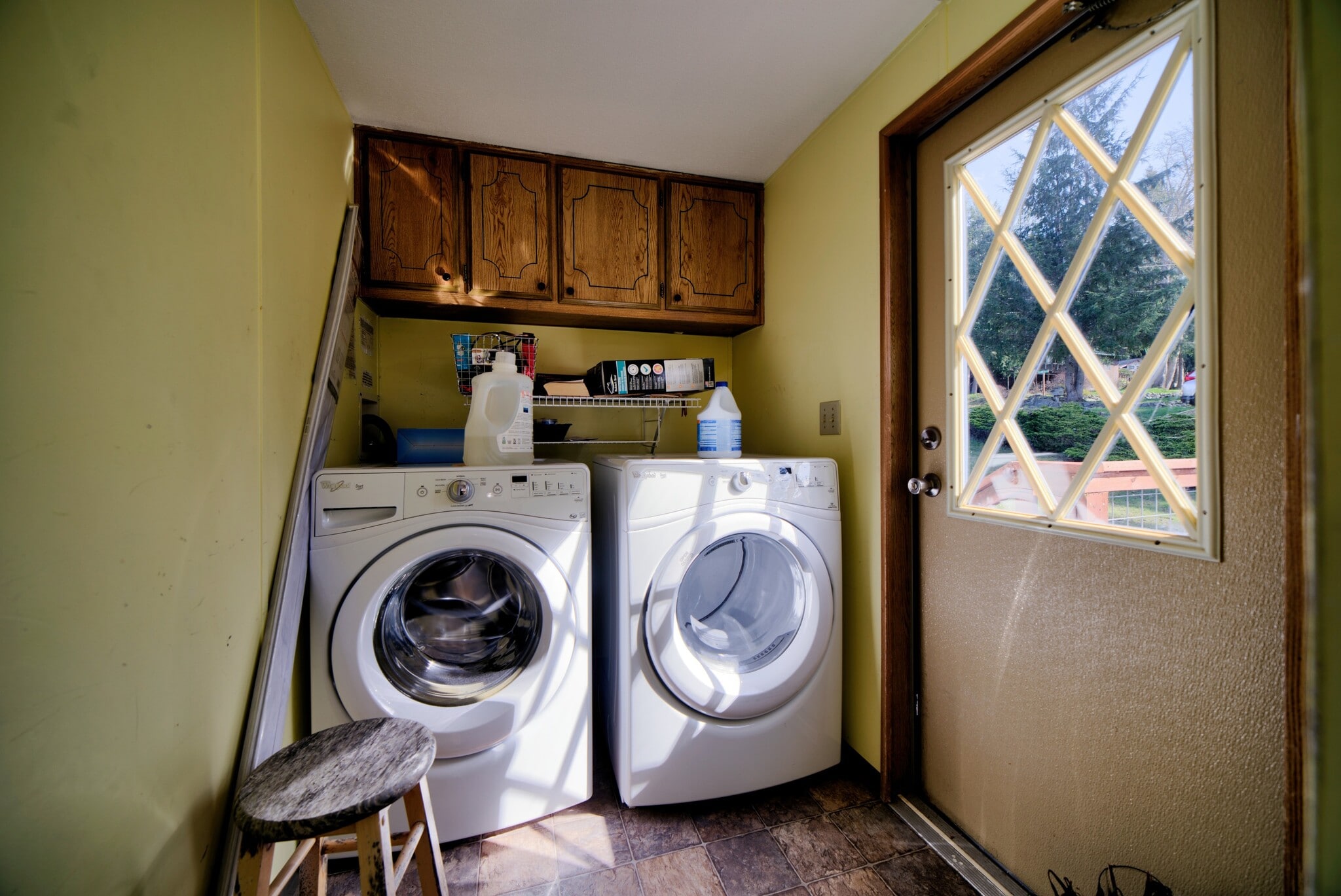 Washer and dryer conveniently located in separate room below pantry. - 5170 W Shore Rd