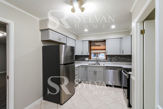 Building Photo - The ideal space to balance life, work, and play.