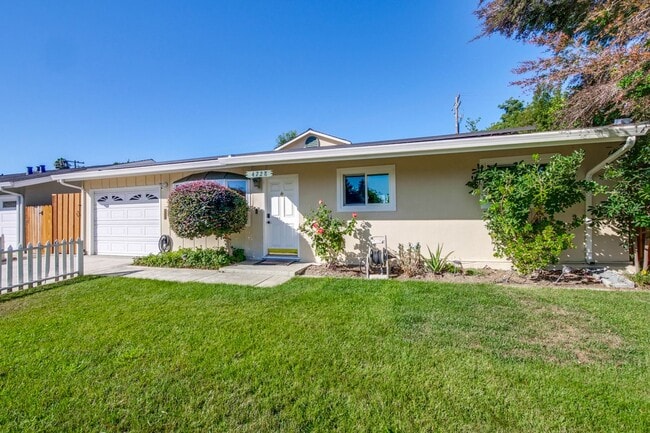 Building Photo - Turnkey Home with Natural Light & Upgrades...