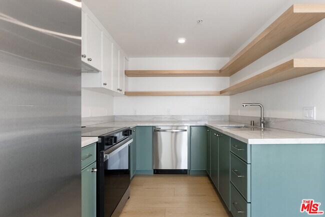 Building Photo - 8561 Belmont St