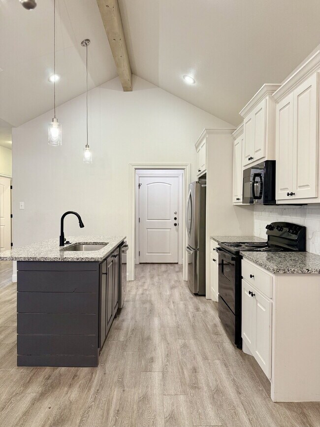Building Photo - Elevated Finishes, Unbeatable Backyard, and a Location That Delivers
