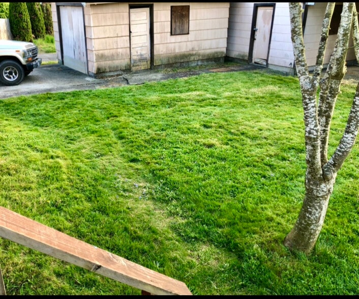 Backyard from deck and small 1-car garage - 601 J Street