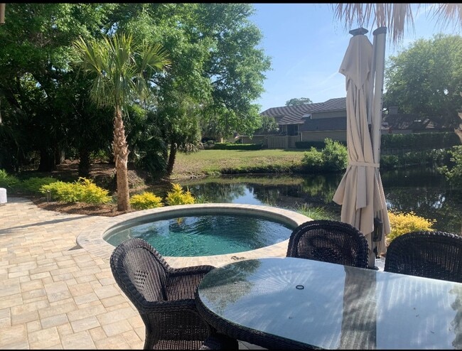 Building Photo - Private Beach Access from this Fully Remod...