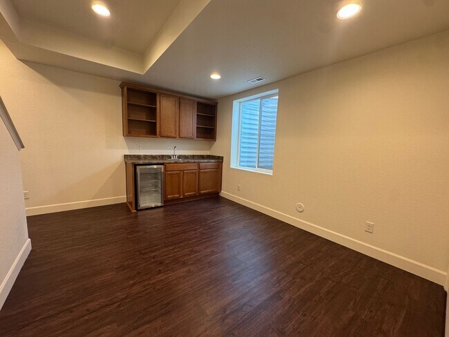 Building Photo - Luxury Corner Lot Home in Banning Lewis with Finished Basement, Wet Bar & Designer Upgrades
