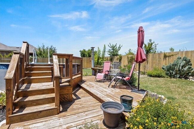 Building Photo - 5642 Meadow Sky