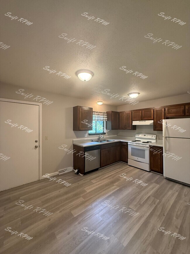 Building Photo - 12915 W 61st Terrace