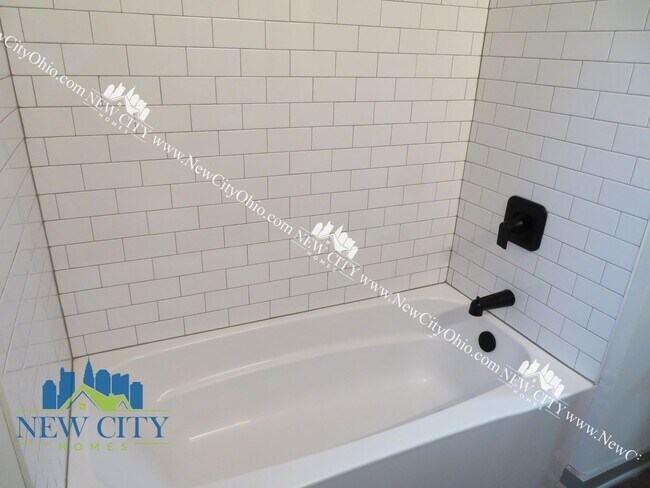 Building Photo - Newly Renovated Apartment Building