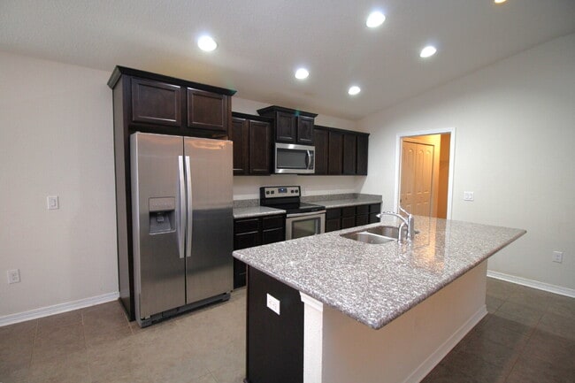 Building Photo - Coming March 16th — Upgraded 3-Bed, 2-Bath Pace Home in The Woodlands with Open Floor Plan, Bonus...