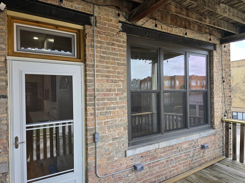 Rear deck with accent lighting and outlets - 1204 N Kedzie Ave