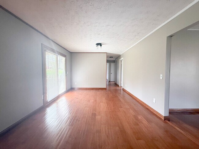 Building Photo - Spacious 3-Bedroom Home with Huge Yard, Covered Porches & Storage Building